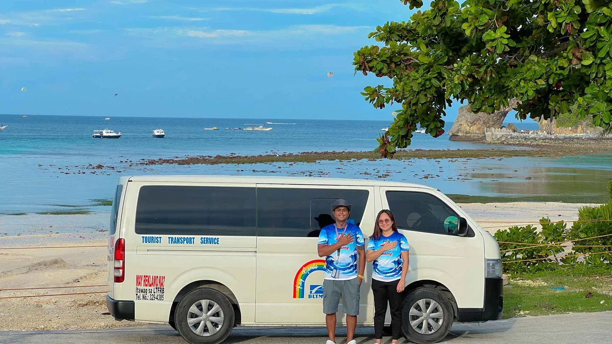 Shared van and ferry transfer from Caticlan Airport to a hotel on a Boracay tours package, Philippines